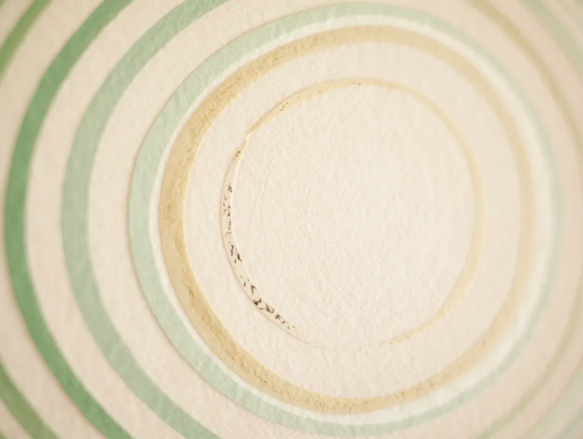 Concentric circles radiating outward representing moments of mindful pause